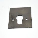 Manganese protected panel for lock cylinder